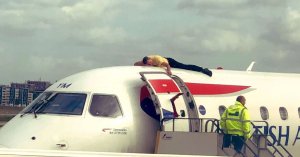 Paralympian Climbs Onto Jet at London City Airport in Climate Stunt